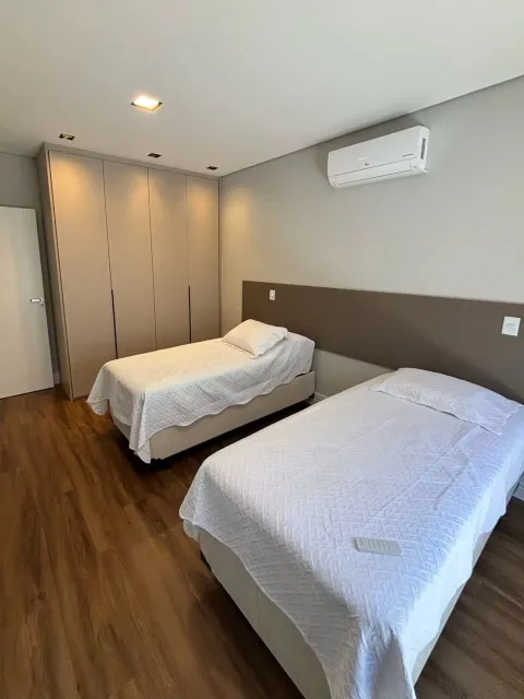 Dormitório com ar-condicionado