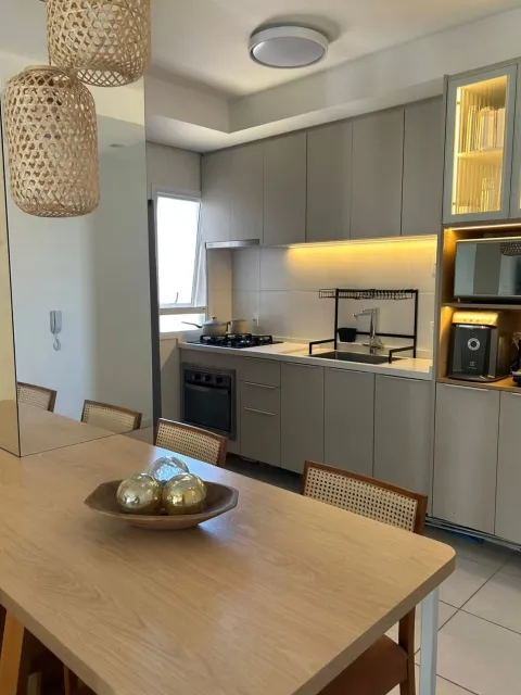 Cozinha planejada integrada à sala